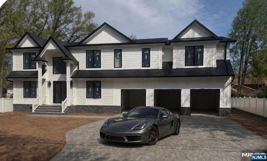 Discover refined living in the heart of Paramus with this stunning new-construction home set on a quiet, tree-lined street. Stone and Hardi Plank exterior, fenced yard, paver driveway and bluestone walkway and patio. This 6,900 sf home features 6 bedrooms, 6.5 Baths, blending modern luxury with thoughtful design and exceptional craftsmanship. The main level features a seamless open-concept layout, ideal for both everyday living and entertaining. A spacious gourmet kitchen flows effortlessly into the dining area and great room w/fpl and 20 ft ceilings, creating a bright and inviting atmosphere. A powder room and a well-appointed guest bedroom with full bath completes the 1st Level. Upstairs, the primary suite serves as a private retreat, complete with a large bathroom w/ Radiant Heat, 2 generous WIC's and gas FPL. 2 Additional ensuite bedrooms and J+J BRs provide comfort and privacy for family and guests, along with a dedicated laundry area for convenience. The finished 2300 sq ft lower level adds an additional versatile living space, featuring a media room perfect for movie nights, gaming, or relaxing. Situated in one of Bergen Countyâ€™s most sought-after communities, this home offers the perfect balance of tranquility and accessibility, with close proximity to top-rated schools, parks, shopping, and easy access to NYC. A rare opportunity to own a beautifully crafted new home in a prime Paramus location.