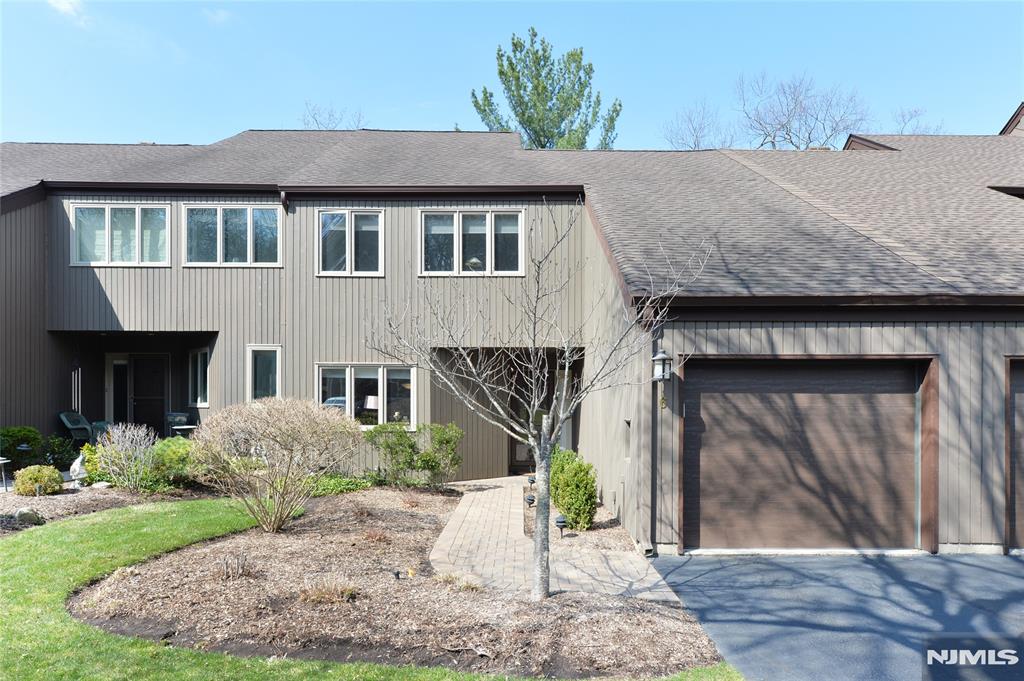 Located in desirable Indian Fields on a prime dead-end street, this well maintained 2/3-bedroom 3.5 bath townhome offers hardwood floors as installed, The Living Room has cathedral ceiling, recessed lighting and a gas fireplace. The dining room can entertain a large dinner party and the extended out door enclosed porch will offer 3 seasons of enjoyment while enhanced by the natural surroundings of a running brook and beautiful mature trees . The kitchen has updated appliances, under counter lighting and large eating area with a beautiful window. The 2nd floor offers a unique 2nd ensuite bedroom and the primary bedroom with a walk-in closet that extends to a private office w/built-ins. both bedroom baths have been updated. The basement with a recreation room, a full bath and a potential 3rd bedroom/guest bedroom has sliders to a patio with views of nature at its best! There is the laundry room and great storage . The homeowner prides herself with her continuous maintenance to keep this home in beautiful condition. Updates: Siding (2024), Paver walkway with lighting (2021), Garage door (2020), Screen Door, HVAC (2022), Hot Water Heater & Water Softner (2021), converted fireplace to gas, cleans dryer vent yearly, windows washed yearly, windows in extended porch replaced and installed indoor outdoor carpeting. This is a PUD community with pool, tennis, pickle ball, bocci, clubhouse. Truly........opportunity knocks!