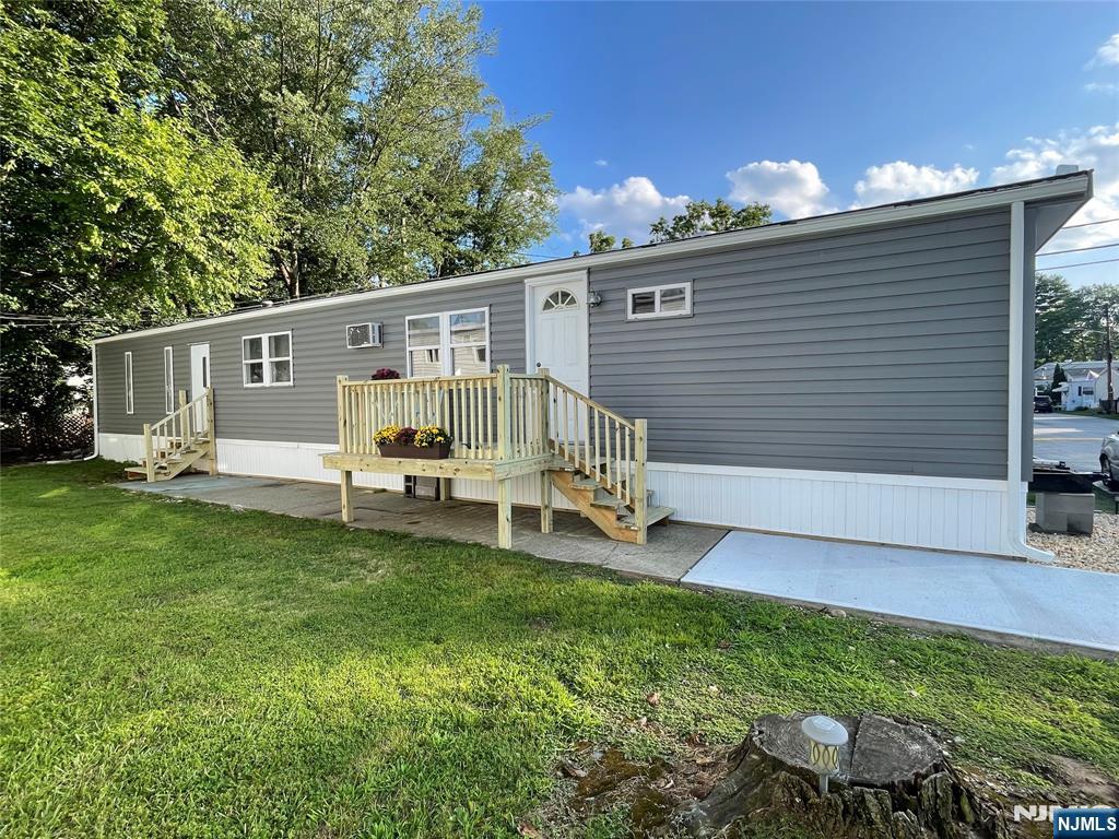 New opportunity to own vs rent in Wayne's desirable Finns Mobile Home Park. This 2 bedroom ,1 & 1/2 bath home was renovated in 2023.Newer luxury vinyl plank floors, crown molding and baseboards. Enter into the living room, with a good-sized bedroom to your right. To your left is the dining area / eat in kitchen depending on how you set it up. Continue down the hallway, pass the half bath on your right and second exit on your left. Straight ahead is the primary bedroom with ensuite full bath. Enjoy the warmer weather seated on the newer deck. Great opportunity to fence in the amply yard for private outdoor space. Potential buyers must fill out community application and be approved before an offer can be accepted. Current NTN required. Cash preferred / mortgage company information available. $1000 monthly fee- includes lot rent, water, septic, plowing, maintenance of common areas