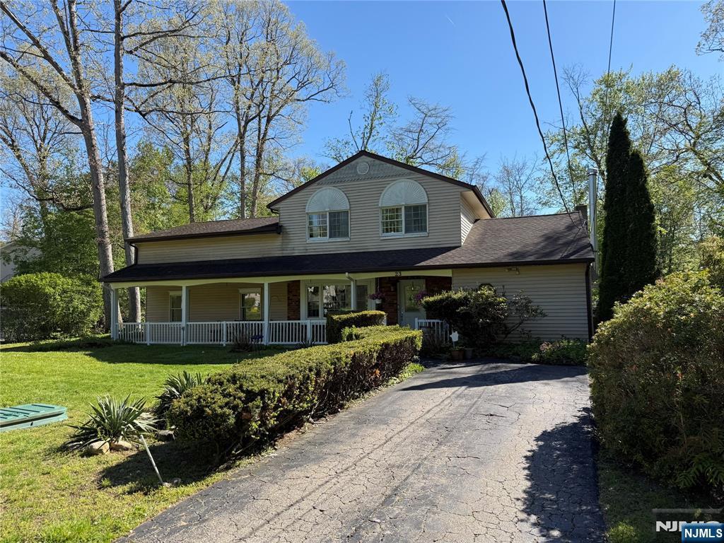 Beautiful Custom Colonial perched on park like property. 3 Bedroom (3rd bed combined into one) Huge Primary bedroom with large closets.large property level lot, updated septic.