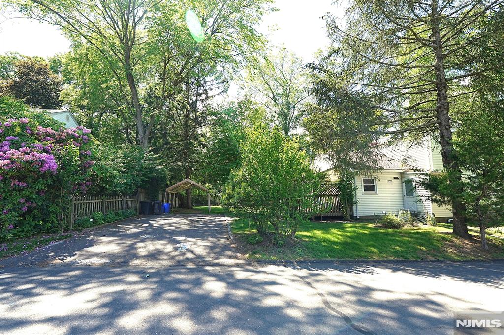 Charming home on the corner of quiet Center St and High St. Driveway is on Center St, spacious enough to fit in 5 cars. Closter is known for its top rated schools, booming downtown and Closter Plaza. Hardwood floors throughout, central A/C, 3 large bedrooms, one additional room (office/den), 2 full bathrooms, and an updated kitchen. Large deck overlooking private, flat backyard.