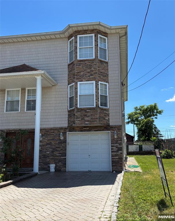 GORGEOUS 3700 SF OF LIVING SPACE IN THIS BRIGHT NEWER CONSTRUCTED DUPLEX . GROUND FLOOR HAS HUGE FAMILY ROOM W/ SLIDERS TO BACKYARD , HALF BATH , SEPARATE LAUNDRY AREA AND GARAGE ENTRANCE. 1ST FLOOR ( MAIN FLOOR ) HAS A GOURMET ALL GRANITE KITCHEN WITH SS APPLIANCES, LARGE ISLAND AND OFFICE WORKING SPACE ALONG WITH ROOM FOR A KITCHEN TABLE. LARGE FORMAL DINING ROOM AND GAS FIREPLACE IN FORMAL LIVING ROOM , XL PANTRY AND LARGE HALF BATH . 2ND FLOOR ( TOP FLOOR ) HAS A BEAUTIFUL PRIMARY WITH ENORMOUS WALK IN CLOSET & GORGEOUS EN SUITE . 2 OTHER LARGE BEDROOMS AND MAIN BATH COMPLETES THE TOP FLOOR. ABSOLUTE MUST SEE !!! CLOSE TO TRANS, SHOPS ETC.. NO PETS , NO SMOKING ... PICS ARE FROM PREVIOUS LISTING ,HOUSE IS NOW BEING CLEANED AND PAINTED AND NEW PICS WILL BE TAKEN