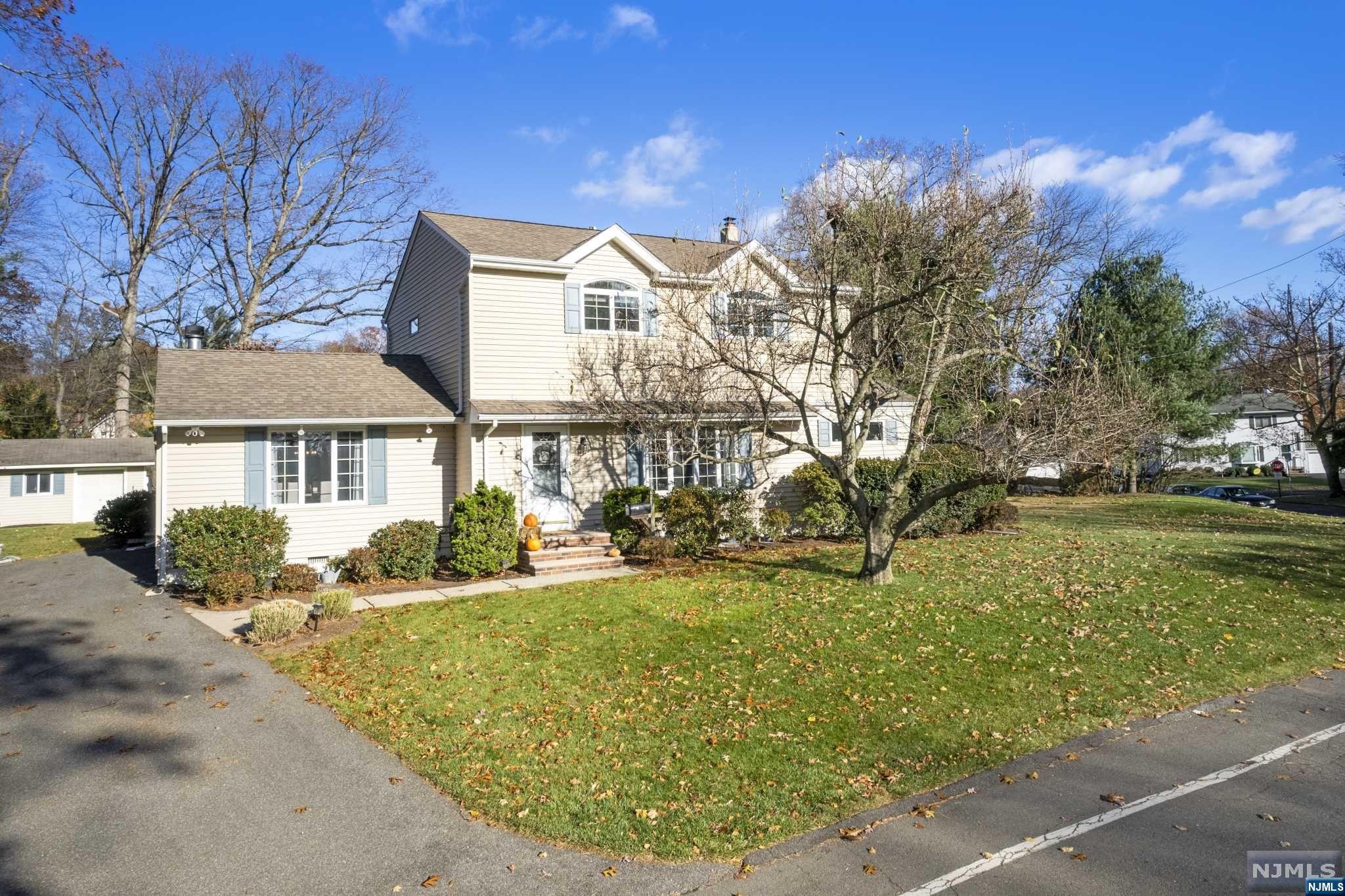 CALL JOHN FREITAG 201-694-4971. Your perfect home search ends here! Step inside this incredible 3 bedroom, 2 bathroom in the coveted "College Section" of Oakland, NJ and immediately know you have arrived home. Upon entering you are immediately welcomed into a sun drenched living room perfect for cozying up on a winter evening. Continuing on into the open concept updated kitchen complete with granite countertops and stainless steal appliances. The kitchen seamlessly flows into a large dining room with wood burning fireplace. First floor concludes with a bedroom, full bathroom and bonus room. Upstairs includes a large primary bedroom with oversized closets, additional large bedroom and updated full bathroom. The partially finished basement has a family room, laundry and workspace. The oversized property has a large deck perfect for BBQ's and a luscious huge lawn ideal for playing fetch with the dog. Come tour this home today as it won't last long!
