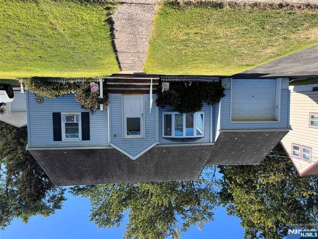 Don't miss the opportunity to own this 4 bedroom ,1 Full Bath Home in a highly desirable neighborhood. Featuring a Living Room, Dining Room, and Kitchen, Full Bath, Basement and Attached Garage. Large yard for Entertaining. Walking distance to Bus Stop & Park. Perfect Place to Call Home, & Make New Memories. Stop By and Bring your Vision.