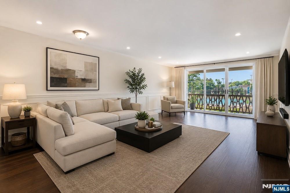 Welcome to luxury living with this beautiful 2 BR , 2 bath home blending a sophisticated interior w/ modern convenience. An abundance of natural light greet you & rich dark hrdwd floors flowing seamlessly throughout. The spacious living room features elegant chair rails & your private terrace, offering the perfect vantage point for morning coffee overlooking the building's outdoor pool. The kitchen is fully equipped w/ stainless appliances, including a gas range, dishwasher, & refrigerator. Both bedrooms are generously sized, w/ east facing windows. The large primary suite boasts a large WIC & ensuite. The building features 24/7 doorman, on-site mgmt, laundry on every floor, outdoor pool, tennis, basketball, & handball courts, a community room, a children's playroom, & an outdoor playground. For summer hosting, the complex offers a dedicated BBQ & picnic area, alongside a fully equipped gym. For the commuter, you NJ Transit buses to NYC are right outside & the Columbia University Irving Medical Center shuttle stop directly across the street. The vibrant Fort Lee Towne Center & Linwood Plaza Shopping Center nearby are home to diverse restaurants, supermarkets, & boutiques. Outdoor enthusiasts will appreciate the close proximity to Constitution Park & scenic trails of Fort Lee Historic Park, offering breathtaking, panoramic views of the Hudson River & the NYC skyline. This turnkey co-op offers the perfect balance of suburban space, luxury amenities, & urban accessibility.