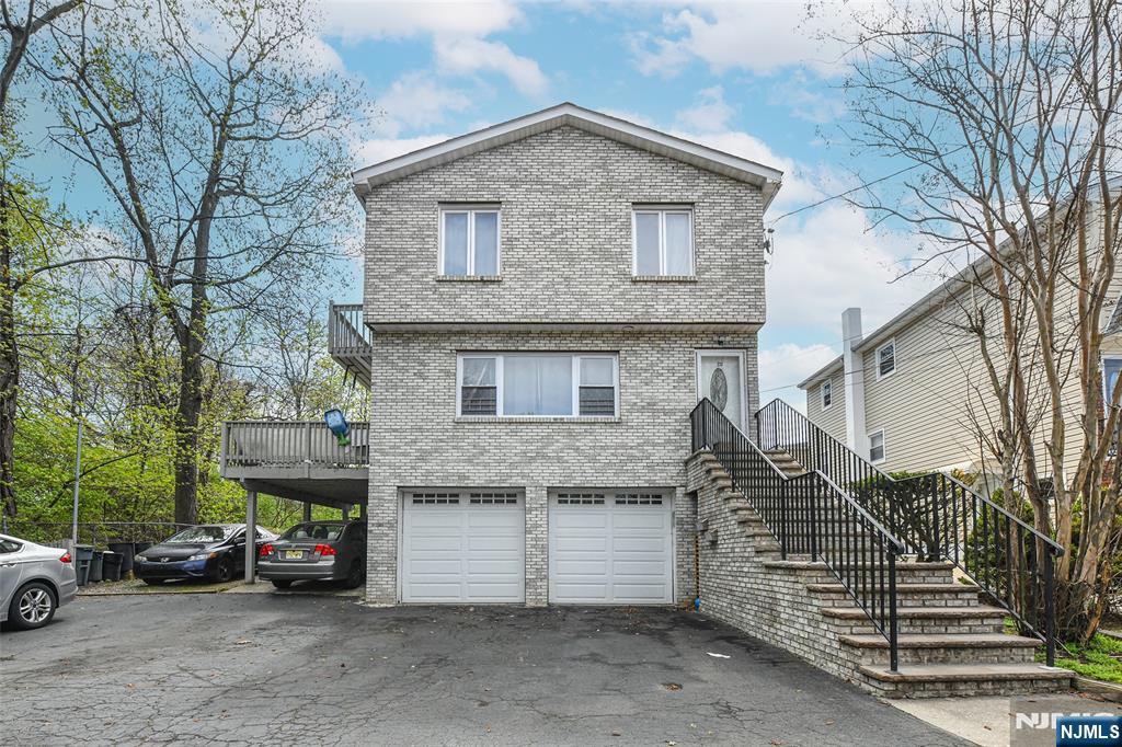 Great Investment Opportunity! Exceptional multi-family property offering space, versatility, and strong income potential. The first-floor unit features 3 bedrooms, 1 full bath, and a spacious open-concept layout with a bright living room, dining area, and kitchen. Enjoy abundant natural light, a large private balcony, and the convenience of in-unit laundry. The second-floor unit boasts an expansive living room with a balcony overlooking the yard, a generous primary bedroom with its own balcony, two additional well-sized bedrooms, and 2 full bathrooms. Washer and dryer are also conveniently located within the unit.