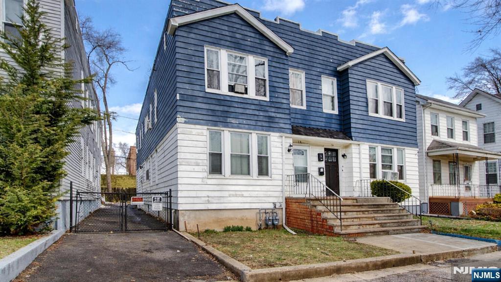 Back on market--buyer couldn't secure mortgage. Stylishly renovated 2-Family Duplex on a charming tree-lined street! Welcome to 18 McKay Avenue-- a beautifully updated, modern 2-family duplex offering a perfect blend of style and functionality. Only the LEFT SIDE of the building is available for sale! First floor unit features 2 spacious bedrooms and 1 full bath, with approximately 1,1250 sq. ft. of bright, open-concept living space. The second floor unit has 3 Bedrooms and one bath. Both units have sleek, designer eat-in kitchens complete with quartz countertops, white shaker cabinetry, stainless steel appliances, and classic subway tile backsplashes perfect for both cooking and entertaining. Recent updates include a new roof (2023) and hot water heater (2026), ensuring peace of mind for years to come. The basement has sump pump and French drains. Take advantage of the unbeatable location--just minutes from major transportation hubs, and a short distance to Orange Park and Elmwood Park for all your outdoor activities. Ideal for investors or owner-occupants! The second floor unit has super kind tenants, paying market rate and would love to stay.