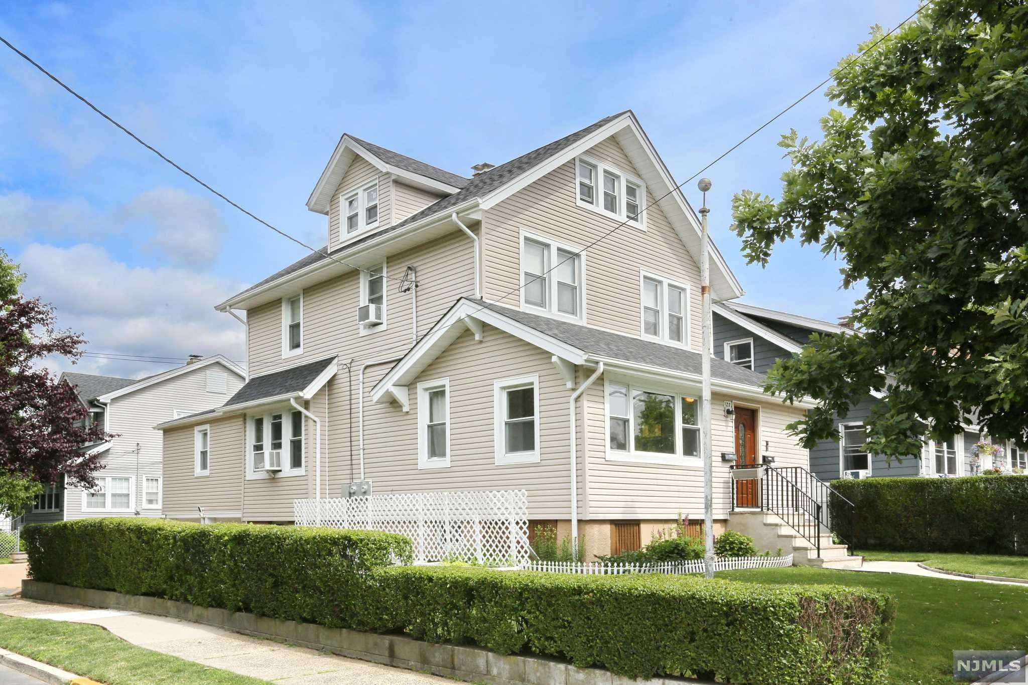 Don't Miss This Large Renovated Two Family Home Conveniently Located on a Corner Lot Near the Heart of Town. The First Floor Offers an Enclosed Porch, Entrance Foyer, Updated Kitchen w/ Granite Countertops & SS Appliances, Large Dining Room, Living Room, Two Bedrooms, & a Full Bath. The Second Floor Offers a Modern Eat-In Kitchen w/ Granite Countertops & SS Appliances, Two Bedrooms, Den/Office/Nursery, Large Updated Bathroom, & Finished Walk Up Attic. Additional Features Include Hardwood Floors, Finished Basement w/ Washer Dryer Hook-Ups & Full Bath, Second Laundry Hook-Ups on First Floor, Two Car Attached Garage As Well As Two Additional Driveway Spaces, Newer Heating, Plumbing, Siding, & Roof. Will Not Last!!!