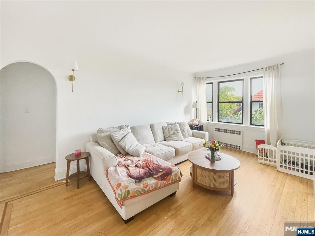 Bright & Spacious 1BR at The Mayfair | Heat & Hot Water Included | Prime Boulevard East Location Bright and spacious true 1-bedroom at The Mayfair, ideally located along Boulevard East in one of North Bergenâ€™s most desirable residential corridors. This well-proportioned home offers a separate living room and bedroom, large windows, beautiful inlaid hardwood floors, charming archways, and classic pre-war details that add warmth and character. The generous living room provides excellent flexibility for lounging, dining, or working from home, while the bedroom comfortably accommodates a full furniture setup. The eat-in kitchen offers full-size appliances, gas cooking, good cabinet storage, and room for a dining table. The bathroom features classic tilework and vintage styling that complements the homeâ€™s timeless appeal. Heat and hot water are included in the rent, offering added value and more predictable monthly expenses. Residents enjoy a welcoming lobby, on-site laundry, and a professionally maintained building environment. Set along iconic Boulevard East, the location offers convenient access to NYC skyline viewpoints, NJ Transit bus service to Midtown Manhattan, nearby ferry options, major roadways, local shops, dining, and James J. Braddock North Hudson Park. Available for June 1st or June 15th occupancy. Floor plan available.