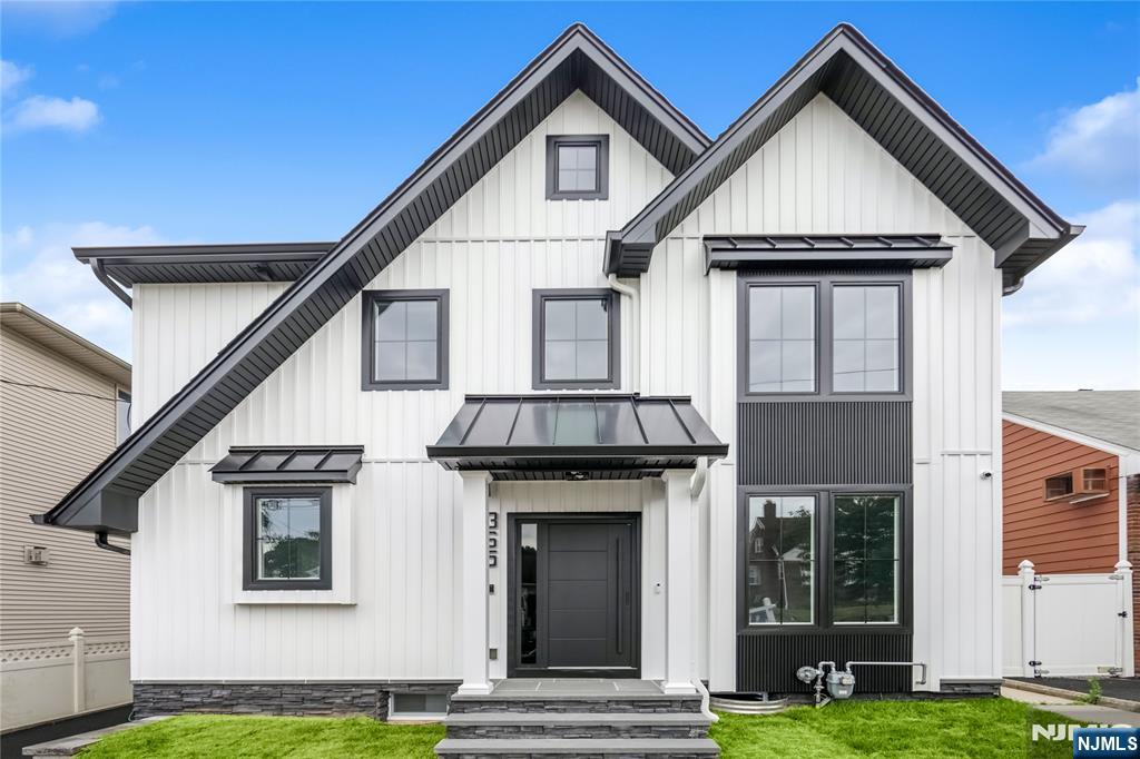 Welcome to this beautifully crafted new construction home offering the perfect blend of modern design and prime location. This 3-bedroom, 4-full bathroom home features hardwood floors throughout, creating a seamless flow across all levels.The kitchen showcases quartz countertops, stainless steel appliances, and ample cabinet spaceâ€”perfect for cooking and entertaining. On the 2nd floor you have 3 spacious bedrooms including a primary bedroom with its own bathroom and walk-in closet. The fully finished basement adds versatile living space and includes a full bathroom, ideal for a home office, guest suite, or entertainment area. The home also features 2 zone central air and heat, central vacuum system and security camera around the property. Conveniently located near NYC transportation, top-rated schools, shops, and restaurants, this home offers both comfort and connectivity. Don't miss this rare opportunity in a sought-after neighborhood!