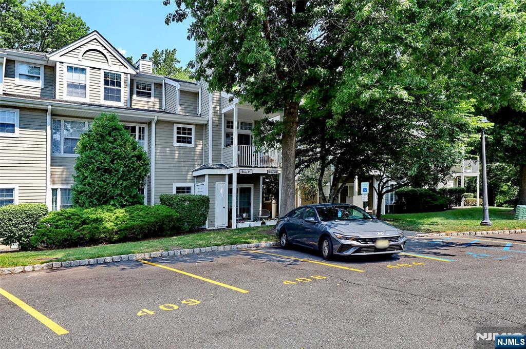 A beautiful, desirable and sun-filled end unit in Paddington Square! This two-bedroom two full bath unit features an updated kitchen with SS appliances and granite countertops. The main level features a generous-size bedroom, with a walk-in closet, a full bathroom, and living room/dining area with vaulted ceilings and Motorized remote-controlled shades. A sliding glass door provides access to a private deck. Upstairs includes the main bedroom, new hardwood floors, a walk-in closet, and a renovated bathroom. Central air! New washer/dryer, new refrigerator. Walking trails, an outdoor pool and a playground! Not to be missed!