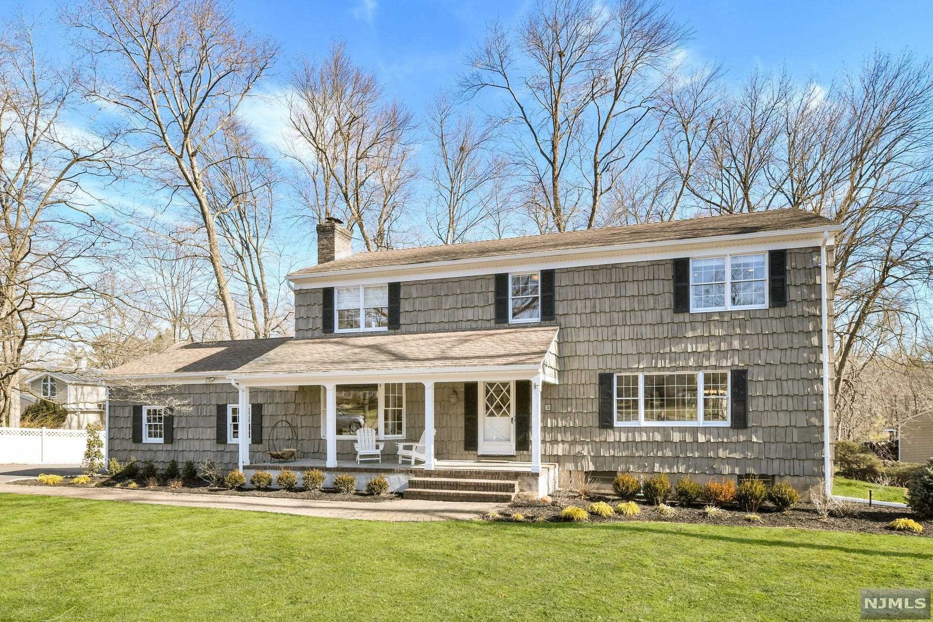 Don't miss this gem! Move right into this RENOVATED 5 BEDROOM, 2 1/2 Bathroom Center Hall Colonial on half acre in beautiful tree lined neighborhood. BRAND NEW professional landscaping & blue stone porch. Living Rm & Dining Rm are open and bright, perfect for hosting holidays. Newer Eat-In Kitchen boasts quartz countertops, stainless steel appliances and is perfectly placed off of dining rm, fam rm, mudroom & has sliding doors to the oversized deck w/gas line to grill, hot tub & plenty of room to seat lots of people. Upstairs you will find 4 spacious BRs & 2 newer full bths, including a primary suite w/spa-like bathroom. Lower level completes the home w/recreation space, a bedroom w/egress window, an office & tons of storage. This beautiful property has lots of room to run & play. Kitchens & bathrooms updated in 2017. Additional features:wood-burning fp, invisible dog fence, u/g sprinkler system, alarm system. Award winning school system in a fabulous community and close to NYC!