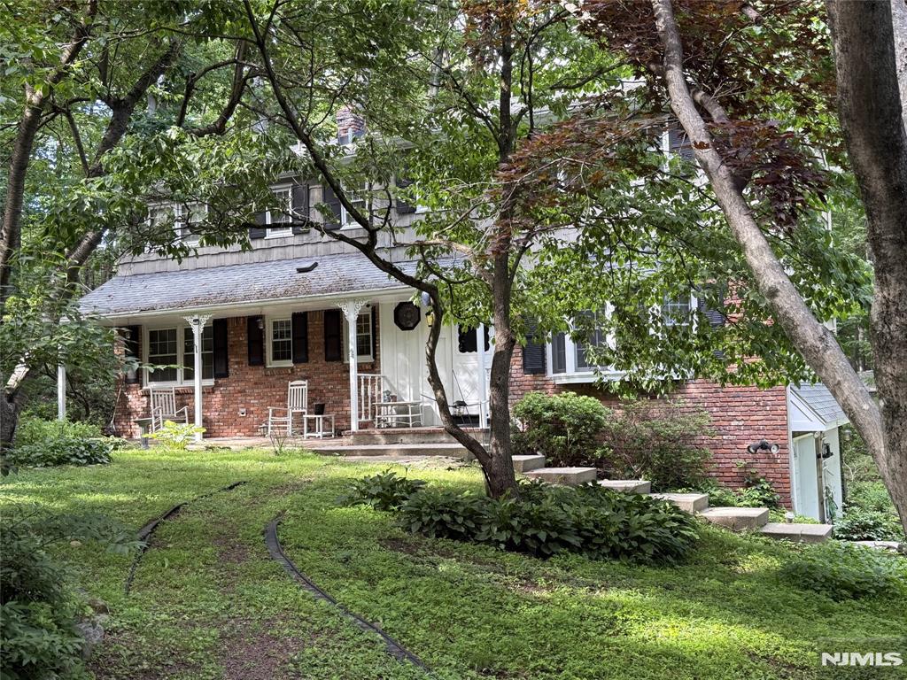 Spacious 4-bedroom Colonial offering exceptional living space, thoughtful updates, and endless possibilities. Nestled on a beautifully landscaped, private property, this home features a welcoming front porch, enclosed rear porch, and generous backyard ideal for outdoor enjoyment. The updated kitchen is equipped with Corian countertops, stainless steel appliances, and a wall oven. Additional improvements include an updated septic system, central air conditioning, and hot water baseboard heating. Hardwood floors extend throughout the home, including all bedrooms, complemented by large room sizes and abundant storage. The expansive basement provides flexible space for recreation, hobbies, a workshop, or future finishing and offers direct access to the attached 2-car garage. Conveniently located near Routes 15, 80, and 23, with access to NYC transportation, shopping, dining, schools, and houses of worship. A wonderful opportunity to customize and make this home your own.