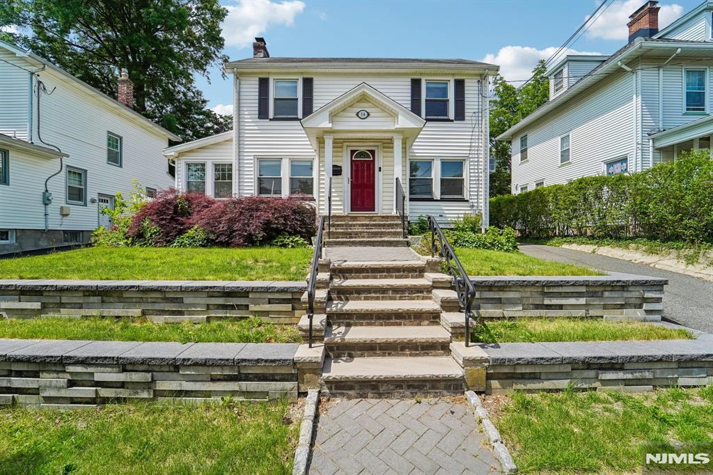 Welcome to 34 Cypress!!! This charming, well-maintained colonial home is located in the highly sought-after Wyoming section of Millburn. Enjoy convenient access to downtown restaurants, shopping, and entertainment, as well as the beautiful South Mountain Reservation. Commuters will appreciate the proximity to Millburn Station, offering an easy NYC commute. Step inside the welcoming foyer, where natural sunlight fills the spacious living room, highlighted by a cozy wood-burning fireplace that adds warmth and character. The bright kitchen features white cabinetry and stainless-steel appliances, creating a clean and inviting space for cooking and entertaining. The second level offers three comfortable bedrooms with stunning treetop views and generous closet space. The finished basement provides additional living space and includes a full bathroom and laundry area. Outside, you'll find a blacktop driveway leading to two detached garages, along with a paved patioâ€”perfect for outdoor relaxation and entertainment. Don't miss this opportunity to own a wonderful home in one of Millburn's most desirable neighborhoods!