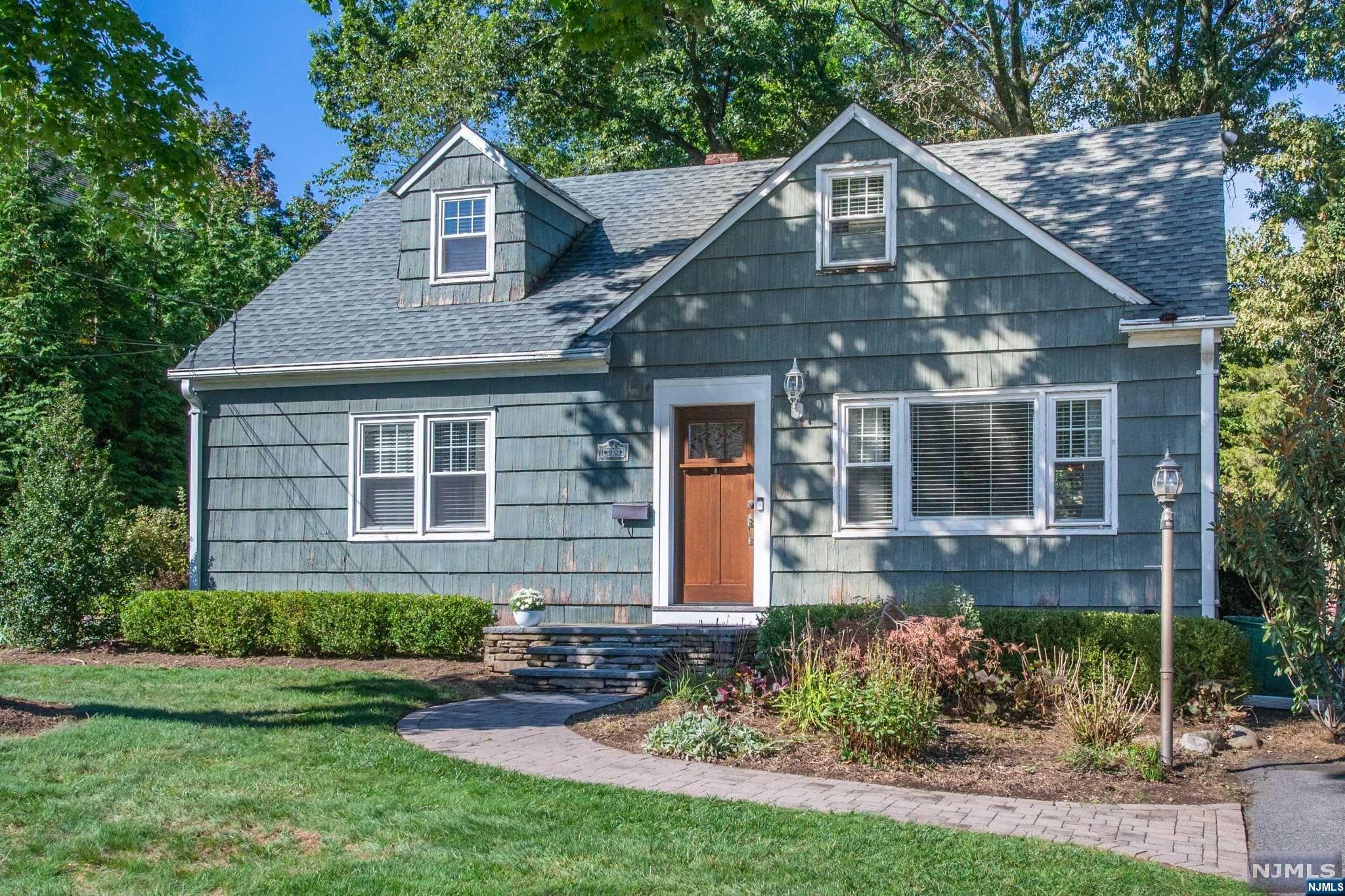 Amazing Opportunity in Midland Park! On a quiet cul-de-sac, tree-lined street, you will find this very spacious and Charming Cape Cod with 4 bedrooms, (3 on the second floor) and 2 full baths. The main level offers a Living rm, dining rm and kitchen that over looks a very private backyard. Also on the 1st floor is a BR/Den, Fbth and Laundry/Office. The second floor boasts a primary BR, BR,BR and Fbth. Amenities inc: Full basement ready to be finished with high ceilings, Paver walk-way, new HVAC, hardwood floors, newer roof, French drains, Double-wide Driveway. All this and excellent schools and close to NYC trans. This Home is just waiting for your personal touches!