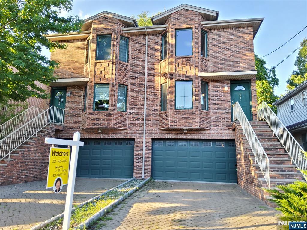 Large Brick Duplex on a quiet Residential Area, Unit is on Right Side, 3 Beds & 3.5 Baths, House facing South, Open Layout, Enjoy Bright & Airy Natural Light streams into Living Rm from morning to evening, Dining Area, Large Eat-in Kitchen opens to Deck, 1/2 Bath, Conveniently Located Laundry Rm on Main Level, 2nd Floor has Large Primary Bedrm w/Double Closets, Jaccuzzi in Primary Bath, Good Sized Bedrooms, Skylight, Ground Floor Family Rm has it's own Full Bath, Sliding Dr(Sep Entrance) to Private Backyard/Patio, Central AC, Central VAC, 2 Compact Car or One Car Oversized Garage w/Opener and Stone Paved Driveway, Convenient Location, Close to Shopping/ School and Bus to NYC.