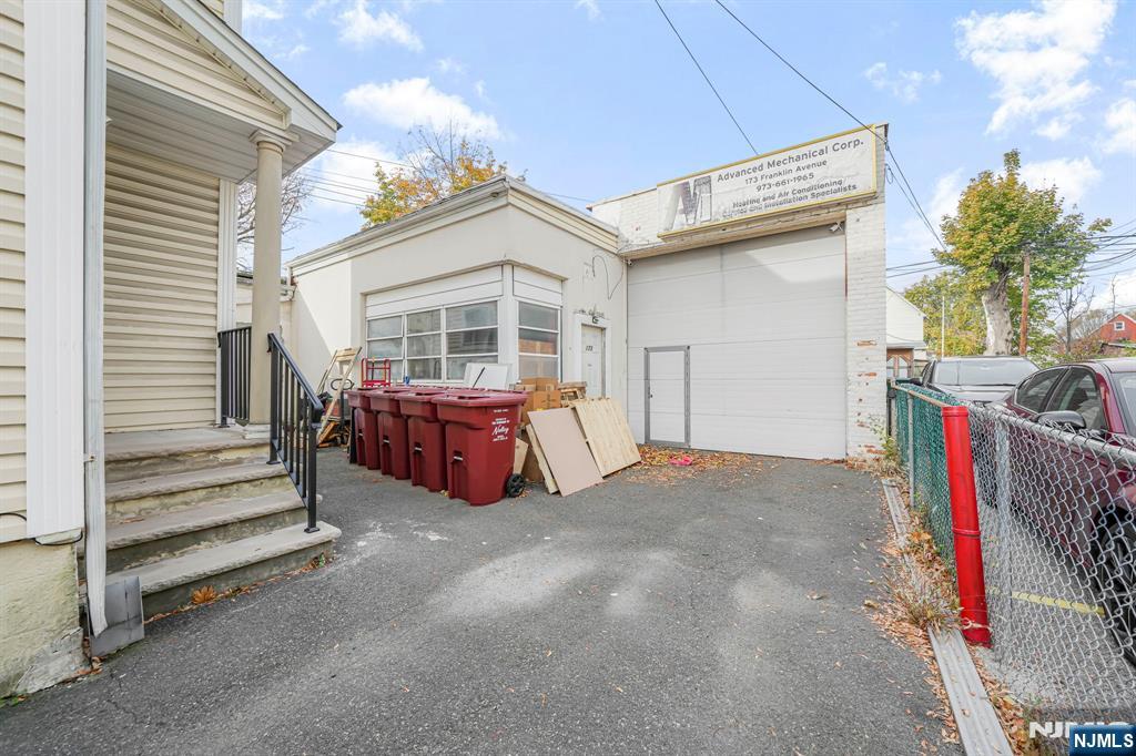 Prime warehouse/office space available on highly visible Franklin Avenue in the heart of Nutley. This versatile 4,600 SF space includes 3,600 SF of warehouse area and 1,000 SF of finished office, ideal for contractors, distributors, service businesses, e-commerce operators, and light industrial users. The warehouse features 16' ceiling height, full climate control, and one overhead drive-in door with a private drive-in loading bay, offering excellent functionality for loading, storage, and operations. The office portion includes a kitchenette, private restroom, and multiple rooms for administration or customer-facing uses. A private driveway provides convenient vehicle access and on-site parking. Located within the B-3A zoning district, the property supports a wide range of commercial and light industrial uses (confirm specific use with the township).