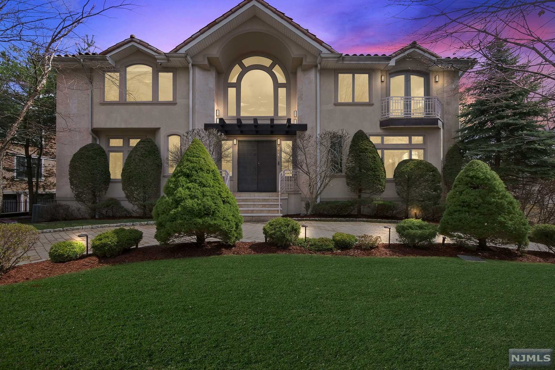 Spectacular home designed and built by renowned architect as his own residence. Large entry foyer leads to a great room with a massive copper fireplace surrounded by built in seats and 2-story windows - living room with access to the deck. Banquet sized dining room and office with builtins. Gourmet kitchen with top-of-the-line appliances, granite countertops and pantry. Powder and laundry room complete the first floor. The second level features a large landing with a 16-foot high atrium skylight. The master bedroom offers two walk-in closets and oversized master bath. There are four additional bedrooms and two full baths. A walkout lower level consists of a large recreation room with a greenhouse, bedroom, full bath and an all-purpose room which exits to the property. Generator, clay roof, beautiful marble and wood floors as well as many more amenities. A fantastic pool with terrace on an oversized property. Truly a custom and unique home.