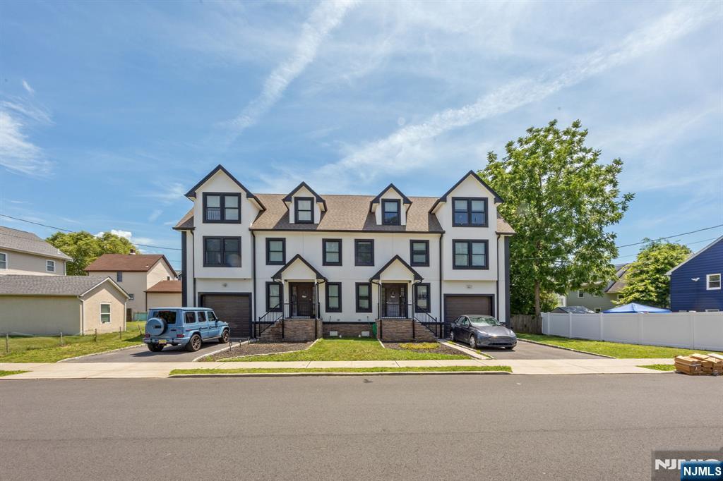 Welcome to this well-maintained, recently built south-facing right-side duplex located on a quiet residential street. This bright and spacious home offers 3 bedrooms and 3 full bathrooms with an open-concept living and dining area, providing a comfortable and functional layout. The kitchen features stainless steel appliances, ample cabinet space, and plenty of natural light. The primary bedroom includes a private en-suite bathroom, and the home also offers in-unit laundry, generous storage, a private entrance, and a private outdoor area. One of the home's standout features is the attached indoor garage with direct access to the ground level, making parking and everyday living especially convenient. Conveniently located near schools, parks, shopping, restaurants, and major highways, this home offers a great combination of comfort, convenience, and location.