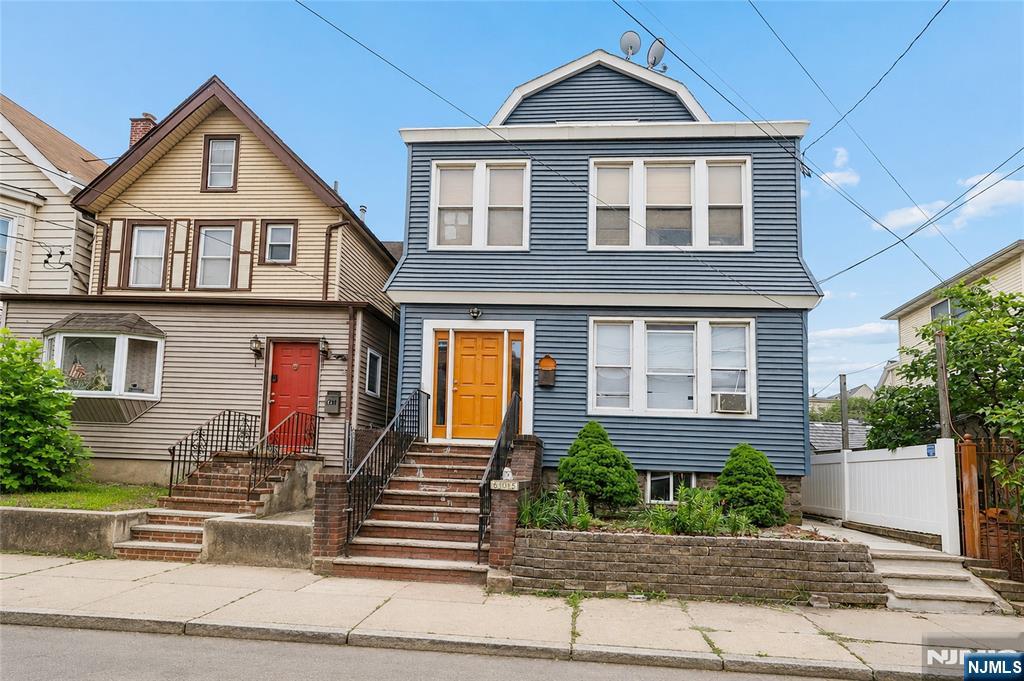 Spacious 3-family house with a fully finished basement, 3 Bedrooms on the first and second floorsâ€”Hardwood floors, close to transportation.