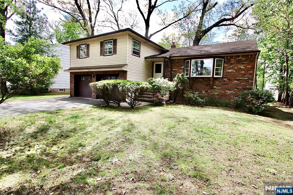 Located in highly sought-after Milnes area, this spacious 3 Bedroom 2 and 1/2 Bath Split Level is ready for a new chapter and so close to schools, NY Trans, Houses of Worship, Bike Path and shopping. 1st Floor offers Entrance Foyer with guest closet, Living Rm w/ vaulted Ceiling and Bay Window, Formal Dining Rm with Sliding Glass Door to Deck, and large Eat-in-Kitchen. Upstairs you will find 3 generously sized Bedrooms, including Primary Bedroom with its own Bath, along with Main Bath. Lower Level Family Room has closet, 1/2 Bath, Lg Pic Window, Entrance to Yard and Ent to 2-car Garage. Partially Finished Basement is ideal for additional living space plus separate work Rm, separate Storage Rm, and Separate Utility and Laundry Rm. 2 Zone newer A/C and heating - With solid construction and well-designed layout, this home is ready for your updates and personal touches offering the perfect opportunity to customize and add value. Enjoy all the amenities Fair Lawn has to offer - town pool, dog park, plenty of parks, activities for all ages, Community Center with walking track & gym, Senior Center, Sports galore - Too many amenities to list - Make this home yours - Fair Lawn is a great place to raise a family