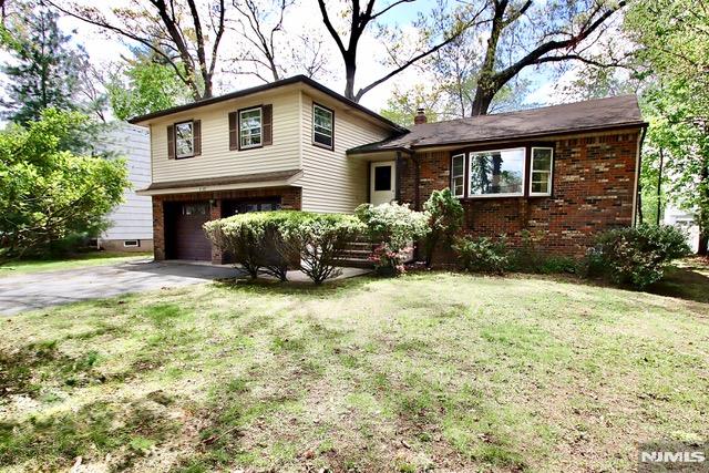 Located in highly sought-after Milnes area, this spacious 3 Bedroom 2 and 1/2 Bath Split Level is ready for a new chapter and so close to schools, NY Trans, Houses of Worship, Bike Path and shopping. 1st Floor offers Entrance Foyer with guest closet, Living Rm w/ vaulted Ceiling and Bay Window, Formal Dining Rm with Sliding Glass Door to Deck, and large Eat-in-Kitchen. Upstairs you will find 3 generously sized Bedrooms, including Primary Bedroom with its own Bath, along with Main Bath. Lower Level Family Room has closet, 1/2 Bath, Lg Pic Window, Entrance to Yard and Ent to 2-car Garage. Partially Finished Basement is ideal for additional living space plus separate work Rm, separate Storage Rm, and Separate Utility and Laundry Rm. 2 Zone newer A/C and heating - With solid construction and well-designed layout, this home is ready for your updates and personal touches offering the perfect opportunity to customize and add value. Enjoy all the amenities Fair Lawn has to offer - town pool, dog park, plenty of parks, activities for all ages, Community Center with walking track & gym, Senior Center, Sports galore - Too many amenities to list - Make this home yours - Fair Lawn is a great place to raise a family