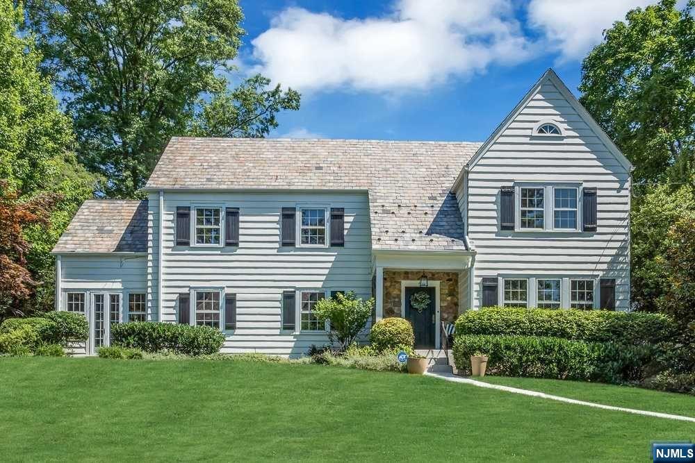 Grand and Stately Colonial nestled in Short Hills and on sought after Twin Oak Road. An open Foyer flanking the Formal Dining Room w/built in's and n expansive Great Room w/a Fireplace and gleaming wood floors; and leading to a Charming Bonus Room serving as the perfect Home Office OR relaxing Sunroom fully wrapped in windows. A sun filled family Room with more built in's is perfect for Movie Nights. Completing the 1st Fl is a white, Stylish and Chef Ready Eat in Kitchen with huge Island, ss appliances, casual dining nook and 2nd Staircase to the En-Suite 5th Bedroom.the dream, private space for guests. Moving to the 2nd fl via a wide staircase are 4 large bedrooms including an Elegant Primary Suite with fp and white bathroom. And, enjoy the common Study or fun Hang Out room on this floor too! Lower level offers Rec Room, Sauna, Wine Refrigerator and lots of storage space with walk out to yard/driveway. This Stunning Home is ready for it's new Owner!