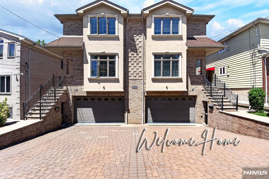 Distinguished by its superior solid brick construction and impeccable maintenance , this sophisticated 4-story residence stands as a testament to enduring quality and thoughtful design. While originally built in 2007 , the home remains remarkably solid and meticulously preserved, offering a level of structural integrity that far exceeds standard builds. The architectural highlight is a rare two-level finished basement, a versatile sanctuary featuring a summer kitchen, full bathroom, and a private walk-out entrance to the backyard. This unique configuration provides an ideal, independent space for extended family or multi-generational living without compromising the privacy of the main floors. The principal living level welcomes you with an effortless open-concept flow, showcasing solid hardwood floors, an expansive family room, and a gourmet kitchen with a central island that transitions seamlessly to an elevated entertaining deck. Upstairs, the serene primary suite features vaulted ceilings and a private bath, complemented by additional sun-drenched bedrooms. Perfectly positioned just steps from the premier shopping, dining, and direct NYC transportation of Broad Avenue, this home is a masterful fusion of robust craftsmanship and an unbeatable location. It is strictly As-Is Sale