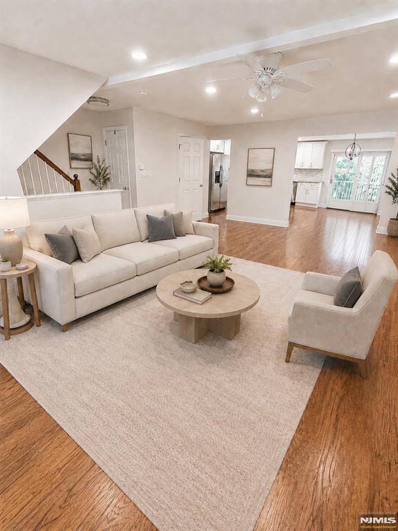 Welcome to 13 Canterbury Lane, a spacious townhome-style condominium in desirable Bergen County. This multi-level home offers approximately 1,680+ sq. ft. with 2 bedrooms, 2 full baths, 1 half bath, a modern open kitchen, bonus basement room, and attached 2-car garage. The main level features bright living and dining areas, fireplace, open kitchen, powder room, and access to a spacious deck. Upstairs offers a private bedroom level with a large primary suite and spacious second bedroom. Additional highlights include laundry/office space, abundant storage, and low-maintenance condo living with exterior maintenance managed by the association. Conveniently located near shops, parks, dining, houses of worship, major highways, and NYC transportation. Completely renovated in 2019, donâ€™t miss out on this rare opportunity to own a spacious move-in ready townhome-style home in a sought-after Canterbury Village community with low HOA fee.
