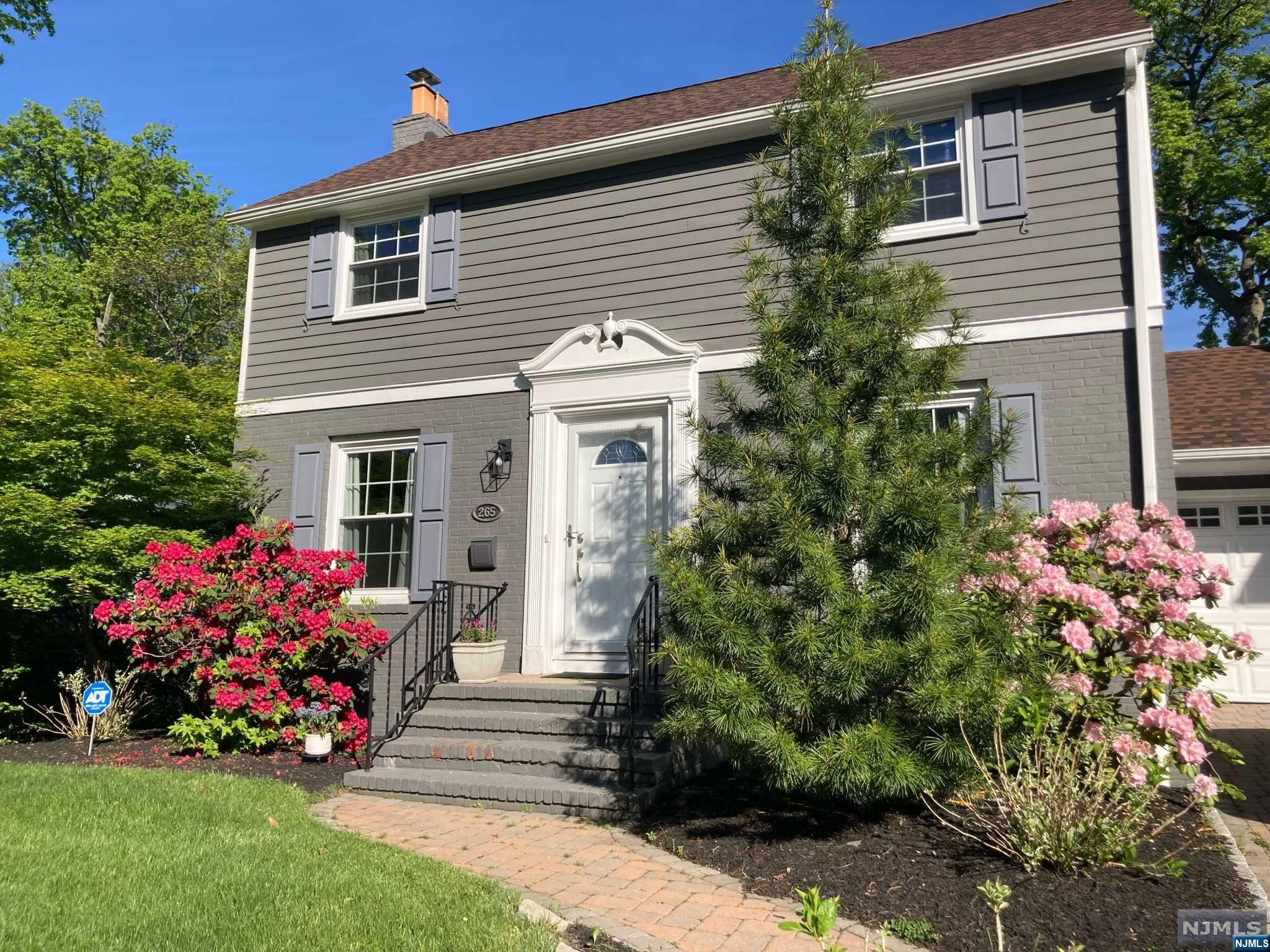 Terrific home on a fabulous block near the heart of South Orange. Fully renovated in 2019 with everything from a bright open kitchen/family room to new windows, recessed lighting, central air, and refinished floors! The dream kitchen offers quartz countertops, large waterfall edge island, stainless farmhouse sink, and a wine bar. But that's only part of this jewel of a home. You'll also love the beautiful living room with a charming fireplace and lovely built-ins, the powder room, and the combination laundry/mud room on the first floor. The second floor provides 4 very comfortable bedrooms, ample closet space, and 2 full baths, including a primary en suite. The yard is lovely with a great patio and perfect views of stunning sunsets. Convenient location: easy access to major highways and vibrant SOMA, and near multiple transportation options - less than a mile to the South Orange Train Station. All you have to do is move in and enjoy!