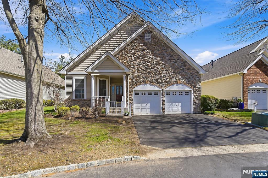 Welcome to the highly desirable Evergreen 55+ community, where comfort and lifestyle come together beautifully. This sought-after model offers 2 spacious bedrooms and 2 full bathrooms, featuring a bright and open floor plan designed for effortless living. The inviting eat-in kitchen with a center island seamlessly flows into a sun-filled sunroom, creating the perfect space for everyday living or entertaining. Step outside to your private deckâ€”ideal for relaxing, enjoying morning coffee, or hosting guests. Additional highlights include a convenient two-car garage and thoughtfully designed living spaces throughout. Evergreen offers exceptional amenities for year-round enjoyment, including an enclosed pool, fitness center, tennis and pickleball courts, bocce, a billiards room, and even a greenhouseâ€”providing endless opportunities to stay active and social. Experience the ease, comfort, and vibrant community lifestyle youâ€™ve been waiting for!