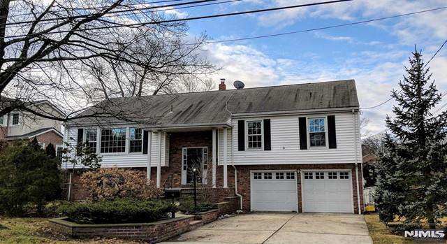 5 bedroom and 3 full bath bi-level home on beautiful quiet street. Hardwood floors, solar panels, 2 car garage, kitchen leading to deck overlooking backyard. Near parks and schools and ten minutes from GWB. *Photos taken prior to occupancy*