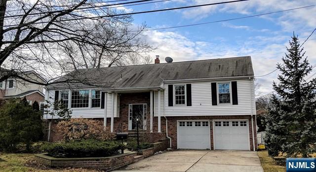 5 bedroom and 3 full bath bi-level home on beautiful quiet street. Hardwood floors, solar panels, 2 car garage, kitchen leading to deck overlooking backyard. Near parks and schools and ten minutes from GWB. *Photos taken prior to occupancy*