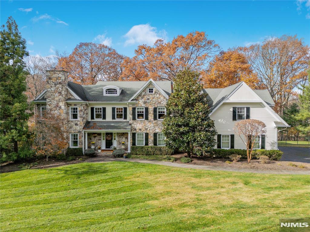 Nestled on a private cul de sac in Franklin Lakes,this stunning custom built Colonial-style luxury estate offers timeless elegance and exceptional craftsmanship.Designed for both grand entertaining and everyday comfort, this home features spacious sun filled living areas,architectural details & serene surroundings for the ultimate in privacy and sophistication.The gourmet kitchen is culinary dream w/professional grade appliances, 2 dishwashers,huge stone center island & abundant cabinetry.The recently renovated owners sanctuary boasts high ceiling custom millwork &FPL.LUXE bath includes tray ceiling,double custom vanity + hammered nickel soaking tub.Two en- suite bedrooms + two additional BDRMS & Jack & Jill FBTH,bonus rm & private office complete this level.Walk out lower level offers endless options w/10ft.ceilings w/access to private rear grounds.The layout of this beauty flows effortlessly & designed for everyday living and grand scale entertaining.Schedule your showing today!