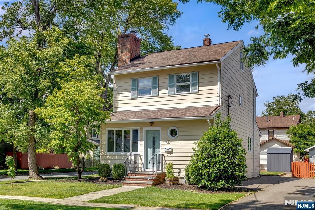 Welcome to 42 Johnson Avenue, a beautifully updated Colonial in Bloomfield's highly sought-after Brookdale neighborhood. Blending timeless charm with thoughtful modern updates, this move-in-ready home offers the perfect balance of character, comfort, and convenience. Filled with natural light, the home features freshly painted interiors and exteriors, recessed lighting, restored original parquet floors on the main level, hardwood floors on the upper levels, and a finished basement with new flooring. Central air and steam heat provide year-round comfort. First floor offers spacious living room with wood-burning fireplace, formal dining room, kitchen with separate dining area, and convenient powder room. Second floor features three generously sized bedrooms and a full bath, while the third floor offers a versatile fourth bedroom ideal as a primary retreat, home office or dressing room. Finished basement provides valuable additional living space, perfect for gym, playroom, or office along with separate laundry room. Outside, enjoy a rare double-width driveway, storage shed, and expansive backyard with plenty of space for entertaining, gardening, and outdoor enjoyment. Ideally located near Brookdale's popular shops, cafes, restaurants, and beautiful Brookdale Park, and just minutes from Montclair's renowned dining, shopping, arts, and entertainment, this exceptional home offers the lifestyle today's buyers are seeking.