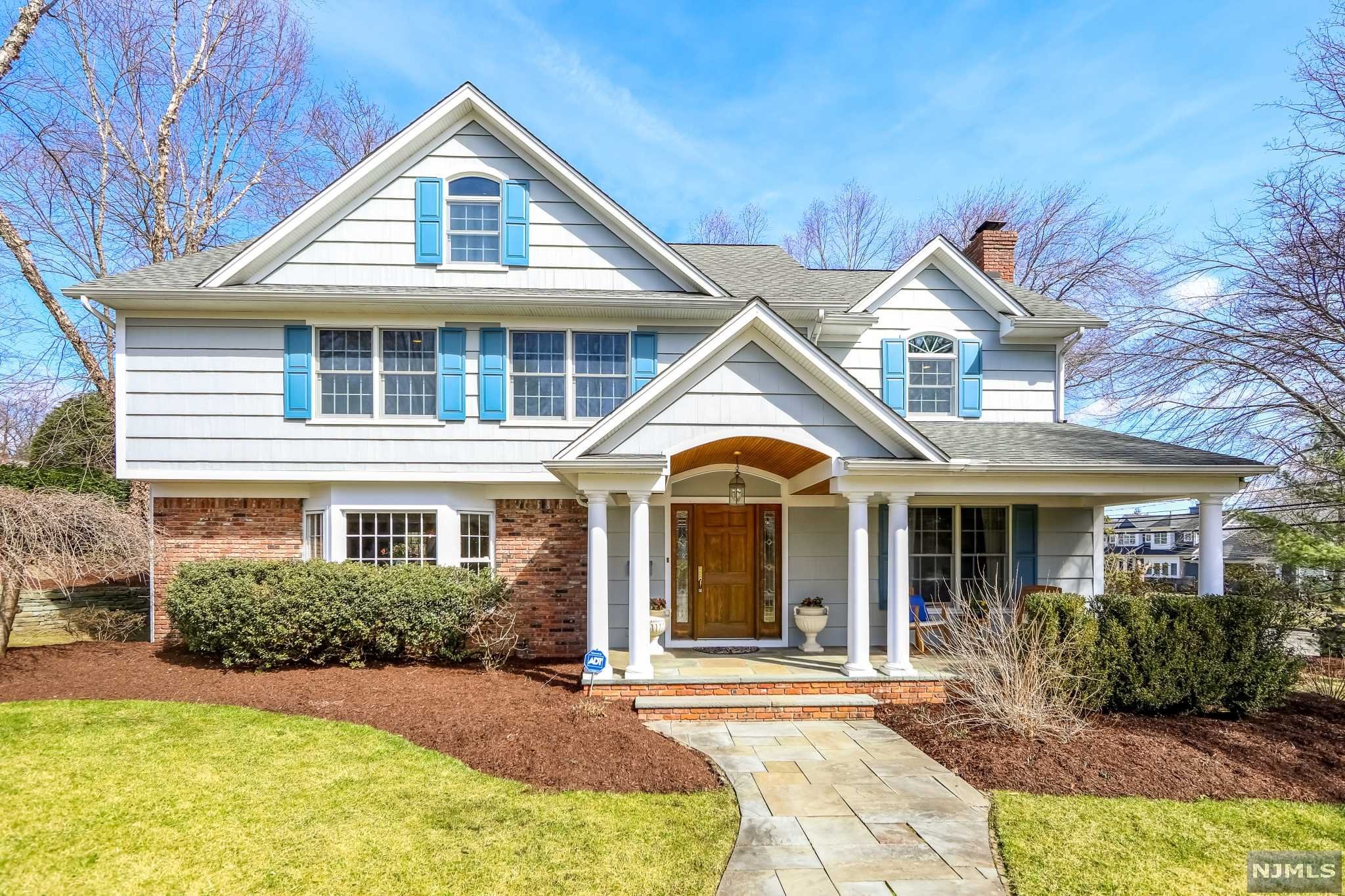 WELCOME TO THIS BEAUTIFUL BRIGHT CENTER HALL COLONIAL IN THE DESIRABLE OLD COUNTRY CLUB AREA. AN OPEN FLOOR PLAN WITH A TRADITIONAL LIVING AND DINING ROOM AND HUGE EAT-IN KITCHEN WITH A WALL OF WINDOWS/FRENCH DOORS THAT OPEN TO THE FABULOUS WRAP-AROUND BLUE STONE PATIO OVERLOOKING THE PARKLIKE PROPERTY COMPLETE WITH PROTECTED VEGETABLE GARDEN. JUST OFF THE KITCHEN IS A FAMILY ROOM COMPLETE WITH A COZY WOOD BURNING FIREPLACE. THERE IS AN UPDATED POWDER ROOM AND CONVENIENT MUDROOM WITH LAUNDRY AND GARAGE ACCESS FOR EASY LIVING. THE SECOND FLOOR HOSTS FOUR GOOD-SIZED BEDROOMS WITH GREAT CLOSET SPACE , INCLUDING THE MASTER SUITE WITH TWO WALK-IN CLOSETS AND A MASTER BATH WITH DOUBLE SINKS, STALL SHOWER AND SOAKING TUB. THE FINISHED BASEMENT OFFERS A GREAT REC ROOM AND DEDICATED OFFICE SPACE. NOTHING TO DO BUT MOVE IN!