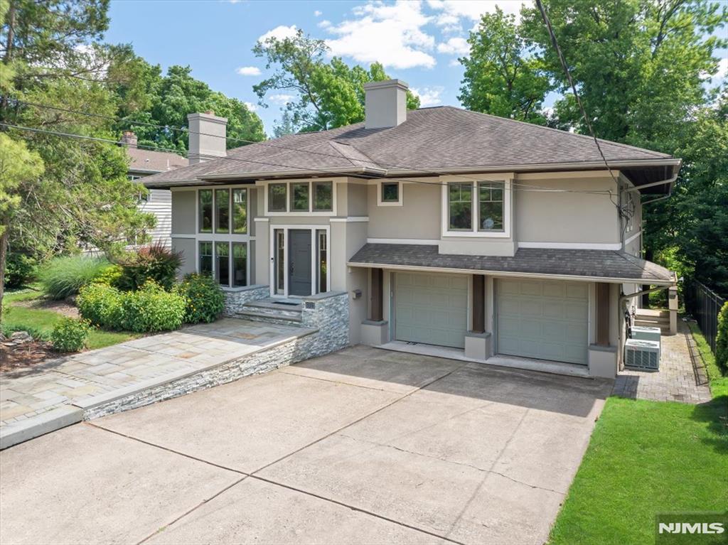 Welcome to this spacious and beautifully situated single-family home in the heart of prestigious Englewood Cliffs. Offering approximately 4,500 square feet of living space on a generous lot, this residence combines comfort, privacy, and convenience. Renovated around 2010, the home features expansive living areas, abundant natural light, and a versatile layout ideal for both everyday living and entertaining. Nestled in one of Bergen County's most desirable communities, the property provides easy access to New York City, major highways, highly regarded schools, parks, and local dining. Enjoy the perfect balance of suburban tranquility and metropolitan convenience while surrounded by beautiful residential streets and mature landscaping.
