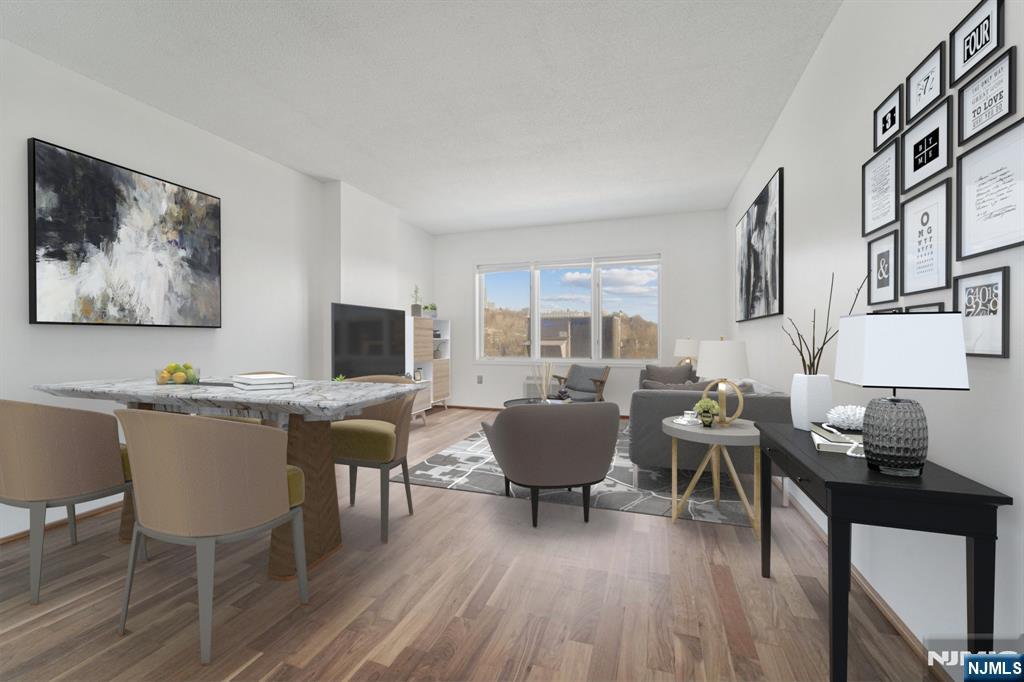 Discover refined living in this beautifully 1-bedroom, 1-bath condo in one of Edgewater's most desirable neighborhoods. This north-facing residence offers stunning views of the George Washington Bridge and picturesque sunrises. Move-in ready, the home features a modern kitchen with premium appliances, quartz countertops, individual heating and cooling units, and the convenience of an in-unit washer and dryer. Enjoy effortless commuting to NYC via nearby public transportation, along with the rare benefit of two dedicated parking spaces in a covered garage. Just moments from the Hudson River waterfront, you'll find premier dining, shopping, and scenic walking paths. Offering the perfect balance of city accessibility and suburban tranquility, this exceptional home is an ideal alternative to Manhattan living. A Deal not to miss