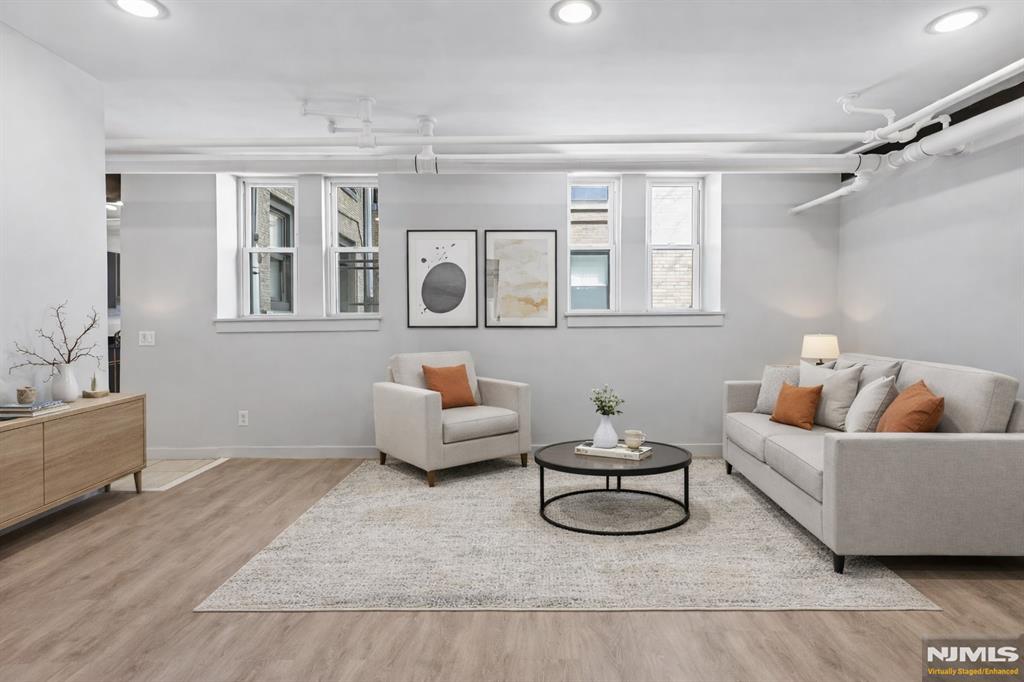 Bright, spacious renovated 2 bedroom in one of Jersey City Heightsâ€™ most elegant pre-war condominium buildings. Maintenance does include heat & hot water. This stylishly renovated apartment features LED lighting, porcelain tile, luxury plank flooring, gorgeous steel columns, and your own private entrance off Webster Avenue. The kitchen includes a sizable pantry, granite countertops, subway tile backsplash & under cabinet lighting. Equipped with a GE dishwasher, refrigerator, stainless-steel gas range and washer/dryer hook-up. Windows in every room fill this unit with natural light. The ceilings are high, and the bedrooms are large - big enough for king sized beds. One of the best locations and a short stroll from Reservoir #3â€™s walking trails, the Pershing Field Athletic Center, Riverview Farmers Market, and the hip shops and restaurants along Central & Palisade Avenues. Abundant transit & Citi Bike options. The professionally managed Reservoir Condominium building is a pre-war gem, featuring a spacious lobby, elevator, and app-enabled video entry system & laundry machines. Condo dues include heat and hot water. Pets welcome. Come see for yourself! This meticulously renovated condominium residence is an opportunity not to be missed. Book a viewing today!