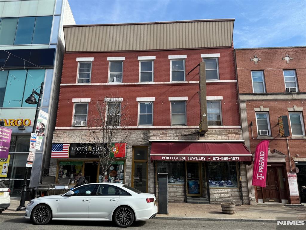 Ironbound - 10 Apartments and 2 Retail Stores (Hardware & Jewelry Store) - Value Add Property Featuring 3 - 1 Bedroom Apartments and 7 - 2 Bedroom (Rail Road Style) Apartments. All Residential Apartments are Below Market Value and Subject to Rent Control. All Tenants are Month to Month. Owner pays for Heat (Oil) and Hot Water for Entire Building. Each Store has Approximately 980 Sq. Ft. Three Story Building w/ Approximately 8,664 Sq. Ft. Built Around 1940 and Zoned C-2. Centrally Located and Minutes By Foot to Penn Station.