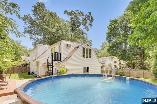 WONDERFULLY RENOVATED DUTCH COLONIAL Featuring 4 BRs & 3 Bath on a 1/4 acre lot. Renovated gourmet Kit with granite countertops & stainless-steel appliances opens up to the Lrg LivRm w/built-ins & fireplace. The DRm is spacious with lg windows to let in natural light. The 4th BR/office is perfect for guests & working at home. The 2nd flr features 3 BRs including a spacious Mstr w/plenty of closet space, and 2 LG RM BRs and a full bath. The beautifully finished Basement includes Rec Rm, Arts & Crafts Rm, Full Bath & Laundry. Backyard is amazing, w/deck & patio, a lavish heated aboveground pool. Award winning Closter schools, hardwood, Plantation shades, skylights, CAC, 2 car garage- all of this and close to NYC! Tenant is responsible for landscaping and snow removal. Kitchen is going through a facelift and will be white.