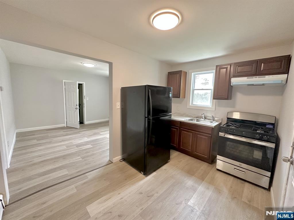 1st floor, fully renovated LARGE 1-bedroom apartment. Located steps from downtown Main Street shopping, entertainment, eateries and close proximity to public transportation and houses of worship.