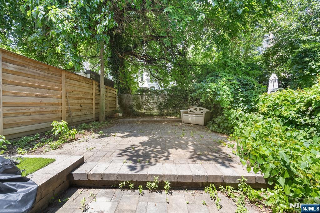 Amazing renovated 771sqft 1 bed/1 bath with private backyard at 812 Garden St. #1! The renovated chefâ€™s kitchen has stainless steel appliances, white granite countertops, subway tile backsplash, and a large island. The oversized living area has a brick accent wall and French doors into the spacious bedroom with closet and built-in shelving. Also included are a private 900sqft backyard, private storage room, and W/D on the same floor (shared with only one other unit). Conveniently located just a short walk from the bus to NYC, Light Rail, Path train, and Ferry, as well as parks, shops, restaurants, and everything Hoboken has to offer.