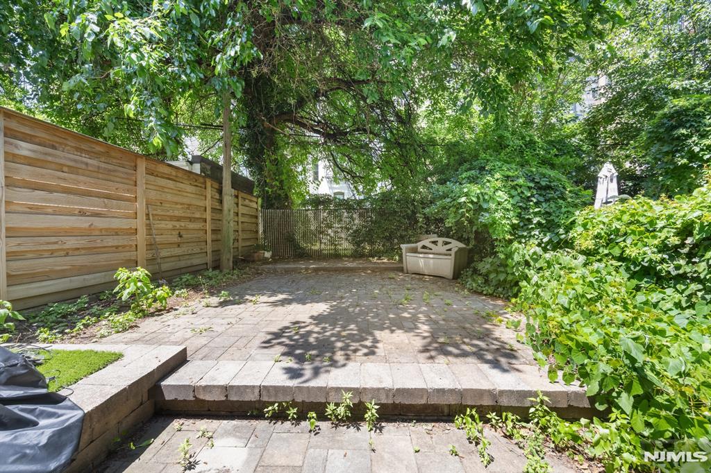 **OH Sun (6/21) 1-3PM** Amazing renovated 771sqft 1 bed/1 bath with private backyard at 812 Garden St. #1! The renovated chefâ€™s kitchen has stainless steel appliances, white granite countertops, subway tile backsplash, and a large island. The oversized living area has a brick accent wall and French doors into the spacious bedroom with closet and built-in shelving. Also included are a private 900sqft backyard, private storage room, and W/D on the same floor (shared with only one other unit). Conveniently located just a short walk from the bus to NYC, Light Rail, Path train, and Ferry, as well as parks, shops, restaurants, and everything Hoboken has to offer.