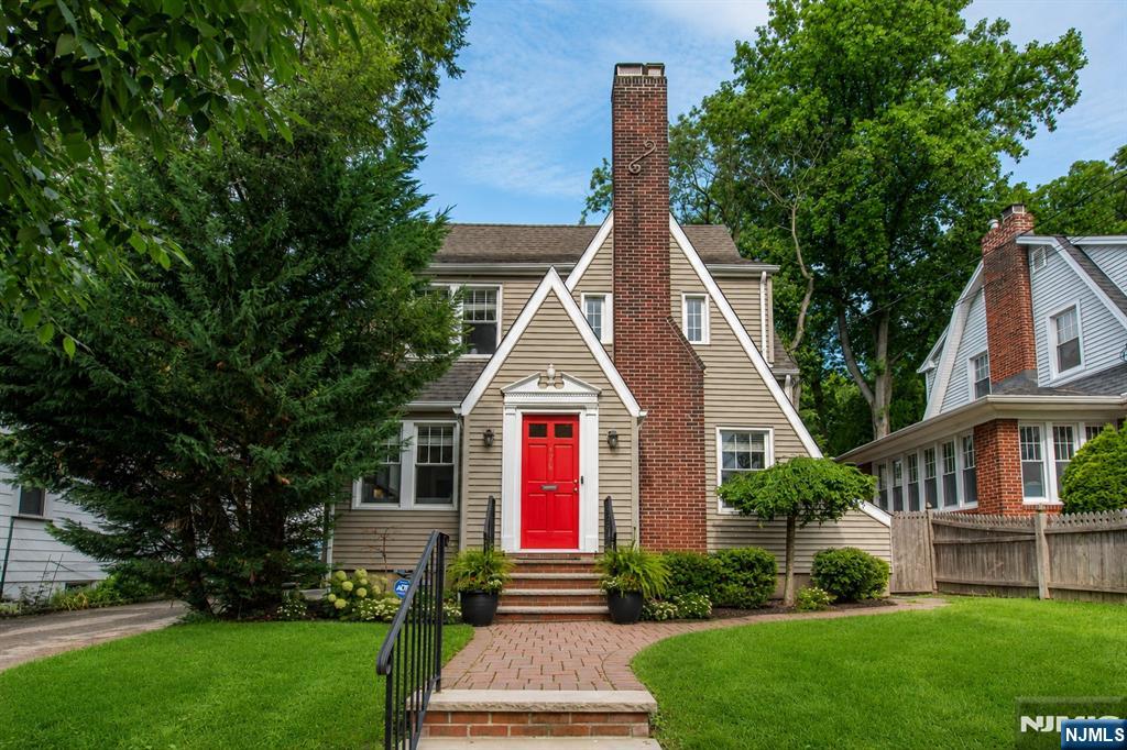 Highest and Best 6/22 by 6pm. Prepare to fall in love with this inviting Colonial Tudor situated in Englewoodâ€™s sought-after Manor section. Showcasing timeless architectural character, a welcoming red front door & beautiful curb appeal, this distinctive residence offers approx. 2,268 sq ft across multiple levels. Upon entry, you are welcomed by a gracious Foyer opening to a sun-drenched Living Room with a gas fireplace as the main focal point. The spacious Dining Room is ideal for entertaining, & the adjoining Kitchen offers generous space with access to a delightful Screened Porch. A private Office & convenient Powder Room complete the main level. Upstairs you'll be greeted to a spacious Primary Bed Room, 2 additional Bed Room's with ample closet space & a conveniently located Full Bath. The 3rd Floor Bonus Room offers flexibility for a Playroom, Home Office, Fitness Area or Rec' Room. The Basement includes a Laundry Area & abundant storage. Beautifully maintained with perfectly manicured landscaping, this home offers a fully fenced backyard for private outdoor living & a detached garage. Conveniently located close to downtown Englewood, parks, shopping, dining, major highways, & NYC transportation.
