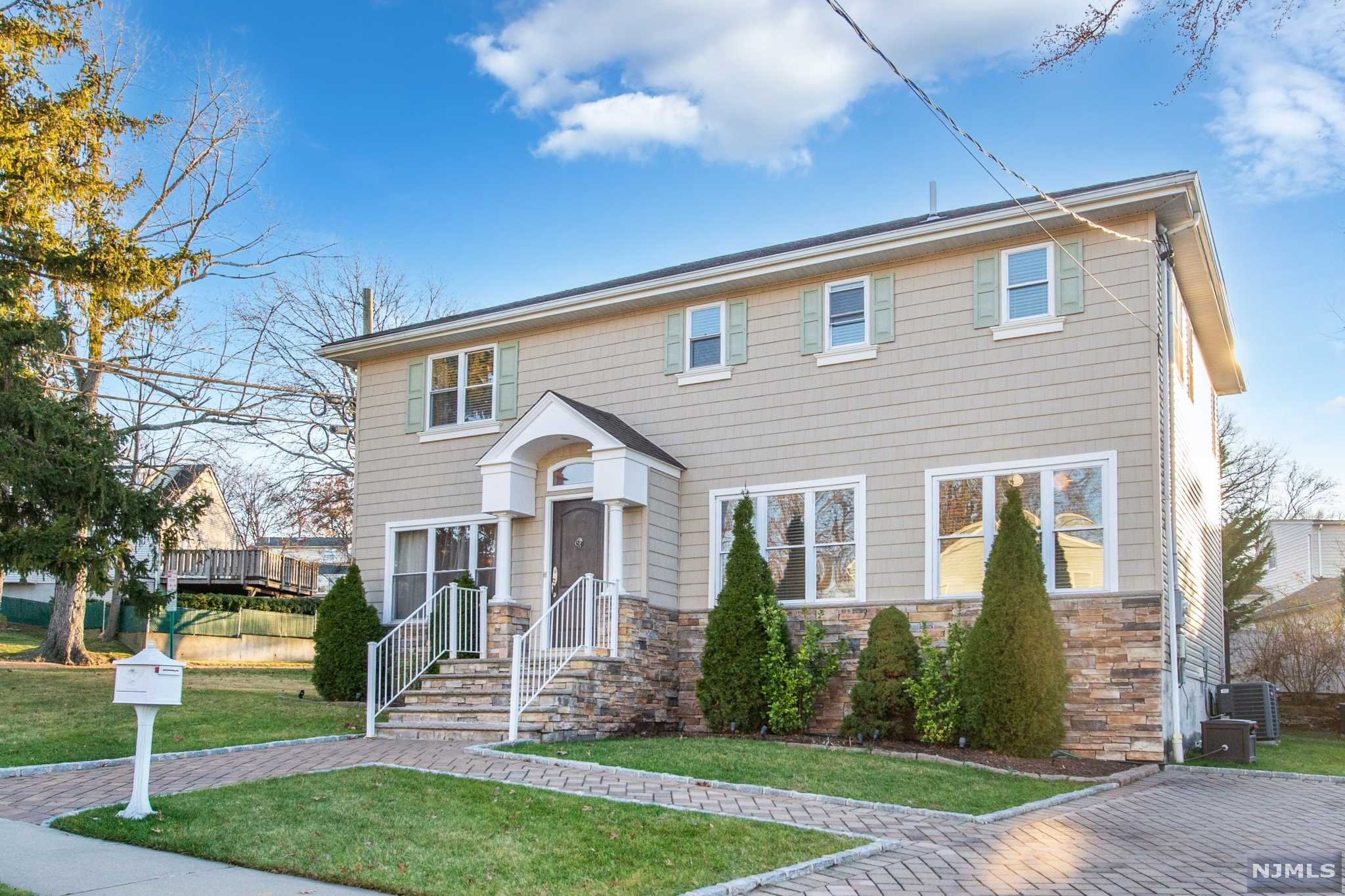 YOUR SEARCH STOPS HERE!! You have found your dream home!! Welcome to 33 Spruce Street!! This 2,114 sq ft home features an open layout, cozy Living room, Updated Kitchen with Granite Counter-tops, stainless appliances with entry out to a deck and large patio area,Kitchen, perfect for entertaining, Spacious Formal Dining Room, Family Room with Gas Fireplace and Powder room. Second Floor features a Gorgeous Master Suite with tray ceiling, WIC, Master Bath with Large Shower, Jacuzzi Tub (not working), double vanity and marble tiles, 2 additional Bedrooms and Full Bath completes this level. Full finished basement with Rec Room, Full Bathroom, Laundry area and plenty of storage. Additional features include Hardwood Floors thru out, Crown and Decorative Molding, Recessed Lighting, Central Air Conditioning, All Lighting fixtures, Ceiling Fan, Stone and Vinyl Exterior, Paver walkway and driveway. Kitchen stove not working Seller will issue a $1,500 credit at close. Close to NYC.