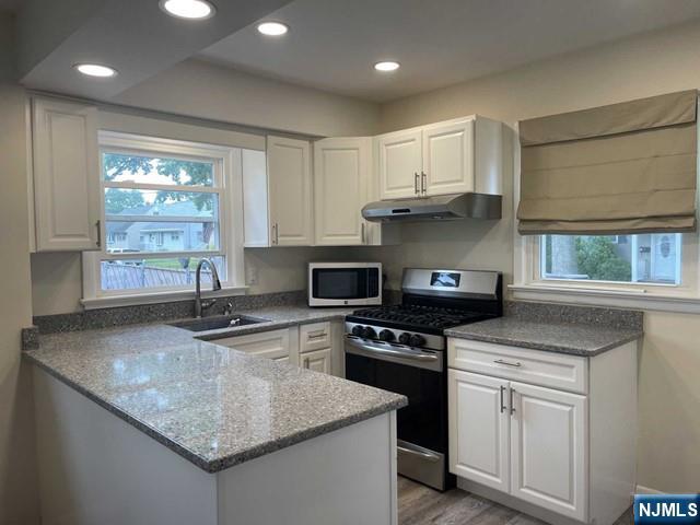Welcome to this spacious single family home rental! Located on a quiet street of Little Falls this home includes a large fenced in backyard, 1 car garage with additional storage plus carport. First floor features updated kitchen, separate dining & living area with 2 great sized bedrooms and a full bath. Second floor features additional 2 bedrooms & full bath with rec space/ seating area & bonus room great for home office/ walk in closet. Basement is full, unfinished with ample amount of storage, laundry area with washer/dryer, utility area. Hardwood floors throughout first floor. Central a/c & forced hot air throughout. Tenant pays all utilities including gas, electric & water/hot water. Must have renters insurance. Tenant responsible for lawn care & snow removal. Pets will be considered. Close to shopping, transportation, restaurants & more!