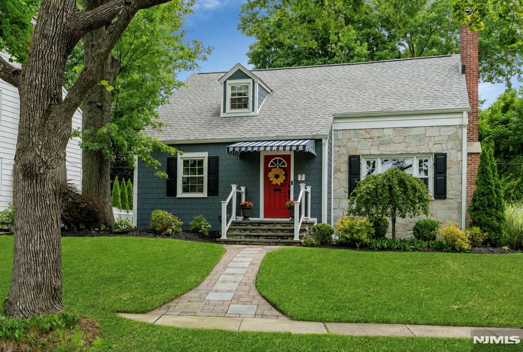 Welcome to 7 Hawthorne Ave, charming Cape Cod on a desirable corner lot in Glen Ridge, thoughtfully updated over the past two years, this exceptional home blends timeless character with modern comfort. The open-concept kitchen features premium countertops, stainless steel appliances, abundant cabinetry, and soft-close drawers, flowing seamlessly into the inviting living room with a cozy gas fireplace. The expanded dining room is perfect for everyday living and entertaining. A rare first-floor primary suite offers a king-sized bedroom, renovated en-suite bath w/a spacious walk-in shower, dedicated laundry room, powder room, and direct access to the attached garage. Upstairs are 3 generously sized bedrooms & an updated full bath. The finished basement provides flexible space for recreation, home office, gym, or media room. Recent improvements include a new roof, James Hardie siding, gutters, furnace, water heater, windows, doors, upgraded electrical service, Wi-Fi-controlled attic fans & a whole-house water filtration system. Outside, enjoy a private fenced backyard with a patio, mature landscaping, & an in-ground sprinkler system. Ideally located near top-rated schools, parks, shopping, dining, vibrant Montclair & NYC transportation. This move-in-ready home offers the perfect blend charm & modern living.