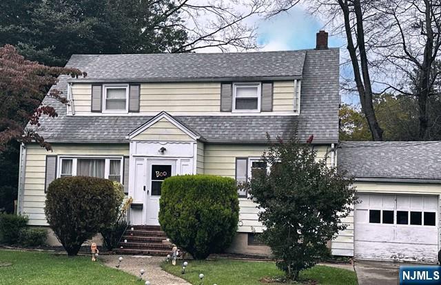 Fantastic opportunity to purchase a 4 bedroom home in the desirable town of Teaneck, NJ. Vestibule entry into the large living room with hardwood floors. Open kitchen and dining rooms w/ door to sundeck. The first floor also features two bedrooms and a full bath. The second floor features the master bedroom with walk-in closet, a half bath & the 4th bedroom. The full basement offers laundry, utilities, storage & access to the backyard. An attached garage & Generac generator complete this special home. House being sold as is with no known issues. ***buyer must intend on owner occupying the property***
