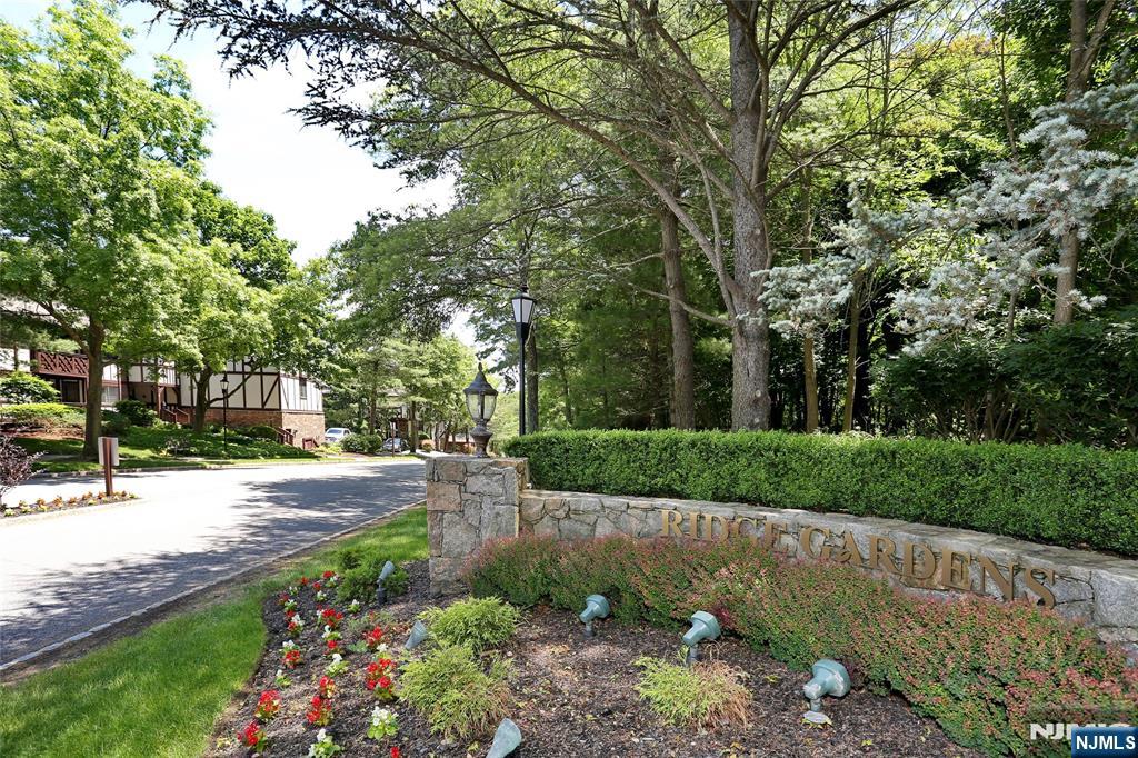 RIDGE GARDENS IN MAWAH!! SPACIOUS 3+BEDROOM, 2.5 BATH, END UNIT TOWNHOUSE. THIS NASH MODEL IS THE LARGEST UNIT BUILT IN THIS DEVELOPMENT. APPROX 2100 SQ.FT. THE FEW UNITS THAT HAVE A 2 CAR ATTACHED GARAGE UNDER NEATH THE UNIT, PLUS THERE IS A SEPARATE LOCKED STORAGE AREA IN BUILDING 13. AMPLE OUTDOOR GUEST PARKING. ENTER THE UNIT INTO THE FOYER, POWDER RM, LIVING RM/GAS FIREPLACE/DRS TO PRIVATE TERRACE, FORMAL DINING RM, LARGE MODERN EAT IN KITCHEN. THE 2ND.FLOOR OFFERS A LG.PRIMARY BEDROOM/DRS TO PRIVATE TERRACE, SEPARATE OFFICE/NURSERY RM, HALLWAY LAUNDRY CLOSET, UTILITY CLOSET, 2 MORE LARGE BEDROOMS AND A HALLWAY FULL BATH/SOT. NEWER CENTRAL AIR AND HEATING SYSTEM. RECESSED LIGHTING THROUGH OUT. IN CLOSE PROXIMITY TO SCHOOLS, SHOPPING, PUBLIC TRANSPORTATION. SELLER HOLDS A NEW JERSEY BROKERS LISC.
